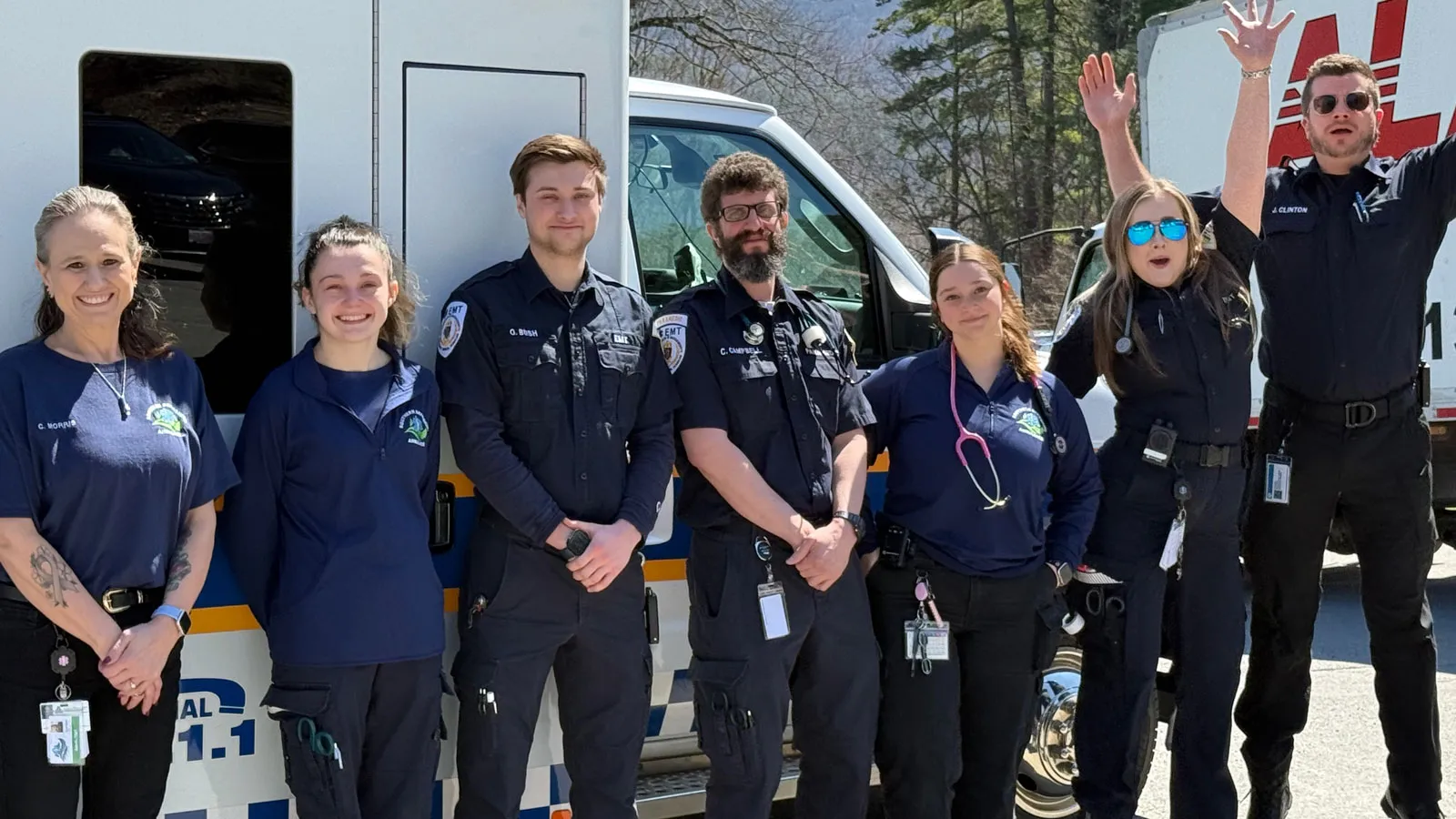 Southern Berkshire Ambulance Squad crew standing beside an ambulance
